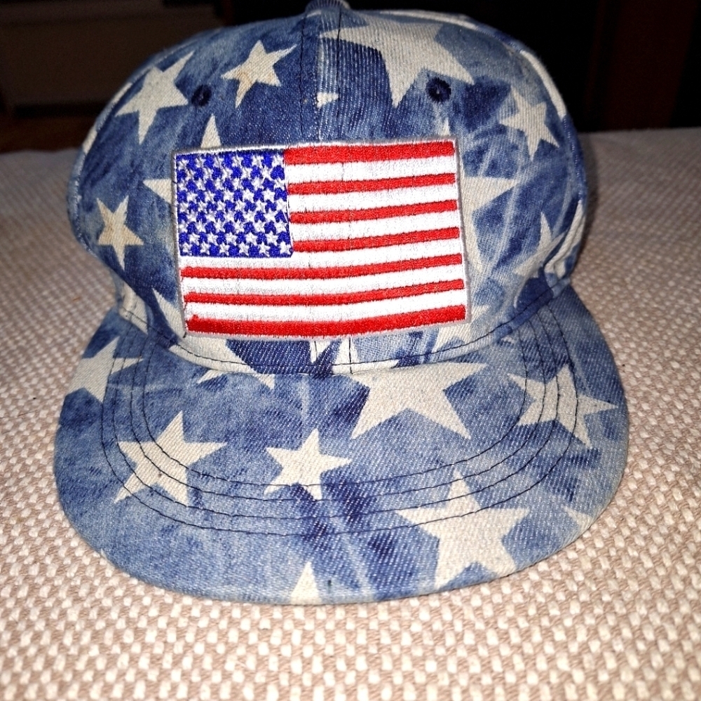 An American Flag snap back hat Lucky 7 Brand.